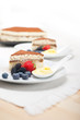 tiramisu dessert with berries and cream