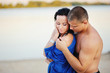 young heterosexual couple on the beach