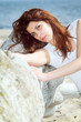 young woman on beach summer holiday