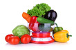 Fresh vegetables in scales isolated on white