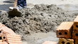 labor mix cement in construction site