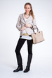 Standing young woman