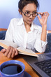 Foto: Young woman working with computer Young woman working with computer
