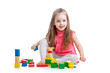 Photo: child girl playing with block toys over white background child girl playing with block toys over white background