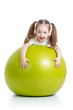 Kid girl having fun with  gymnastic ball isolated