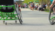 Group of people with disabled friends in wheelchair