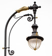top of a cast iron streetlight with gilded elements