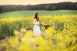 Young woman with bike