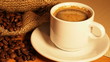 Vídeo: candle with a cup of coffee. Coffee cup rotates candle with a cup of coffee. Coffee cup rotates
