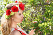 Foto: Young woman in a garden Young woman in a garden