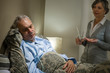 Ill old male patient and caring wife