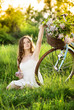 Young woman with bike