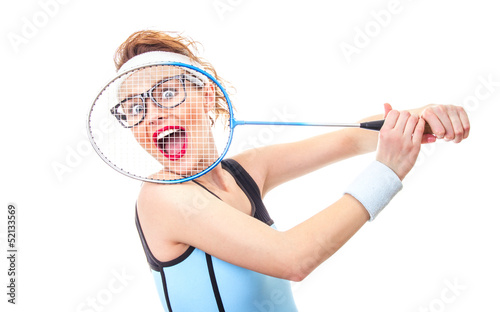 Photo: Surprised funny fit woman playing with recket Surprised funny fit woman playing with recket