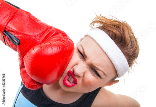 Photo: Funny fitness woman with boxing gloves Funny fitness woman with boxing gloves