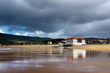 plentzia beach with stormy weather and reflections