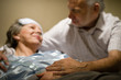 Old woman in pain lying bed