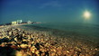 Coastline, waves washing shore at sunset