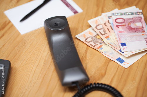 Photo: Heap of the money on office table Heap of the money on office table