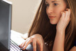 Beautiful woman relaxing with notebook