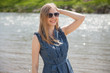 Photo: Beautiful young woman walking outdoors Beautiful young woman walking outdoors