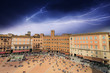 Photo: Wonderful aerial view of Piazza del Campo, Siena during a storm Wonderful aerial view of Piazza del Campo, Siena during a storm