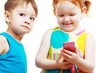boy and girl playing with mobile