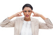 Photo: Concentrated businesswoman putting her fingers on her temples Concentrated businesswoman putting her fingers on her temples