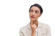 Smiling businesswoman thinking
