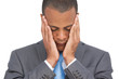 Photo: Stressed businessman holding her head between hands Stressed businessman holding her head between hands