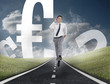 Happy businessman running on a road with euro currency