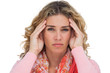 Blonde woman suffering with headache