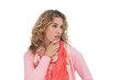 Blonde thoughtful woman posing while touching her chin