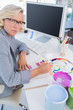 Photo: Focus interior designer looking at colour charts Focus interior designer looking at colour charts