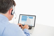 Call center worker viewing social media profile