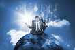 Businessman sitting on top of the world with data server