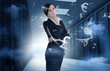 Businesswoman standing in data center with currency graphics