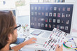 Photo editor working on the contact sheet