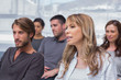 Patients listening in group therapy