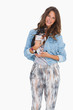 Smiling woman with her puppy