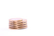 Mini coins tower isolated on a white