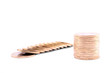 Mini coins tower isolated on a white