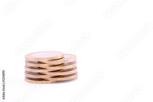 Photo: Mini coins tower isolated on a white Mini coins tower isolated on a white