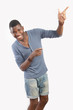 Fun gesture, young man laughing pointing