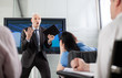 Photo: Boss yelling at his employees at a briefing Boss yelling at his employees at a briefing