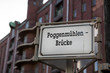 Sign on an old bridge in Hamburg, Speicherstadt