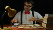 Funny ecstatic rich nerd man with money