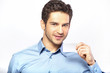 Good-looking man holding business card