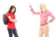 Angry mother shouting at her daughter