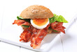 Bread bun with crispy bacon