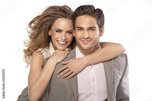 Photo: Delicate woman huging her husband Delicate woman huging her husband